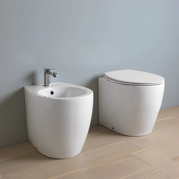 Artceram STEP  Унитаз напольный, приставной 36х51см., слив универсальный, с креплениями, с сиденьем, микролифт, цвет: белый